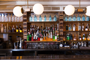Image of big bar in night restaurant - obrazy, fototapety, plakaty
