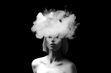 creative of art woman portrait and smoke in face. black in white portrait and smoke on black...