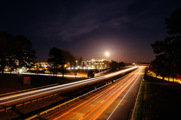 Fototapeta na wymiar Long Exposure of cars on city highway at night.