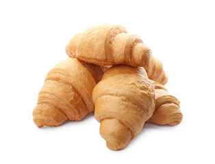 Tasty croissants on white background