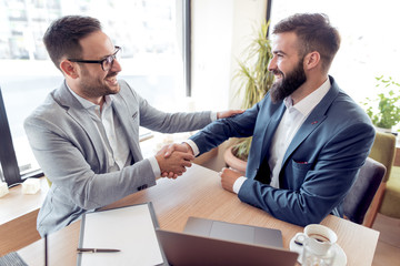 Business people shaking hands