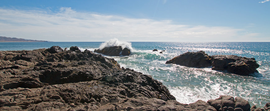 Rocky surf Point Break at Cerritos Beach between Todos Santos and Cabo San Lucas in Baja California Mexico BCS