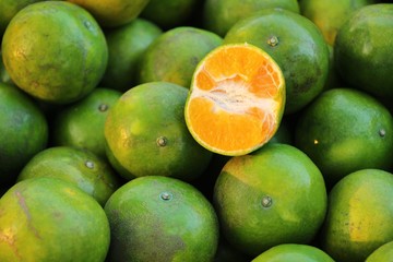Ripe orange fruit is delicious at market