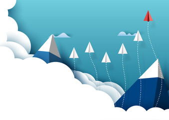 Paper airplanes flying from clouds above mountains and blue sky.Paper art style of business teamwork creative idea concept.Vector illustration