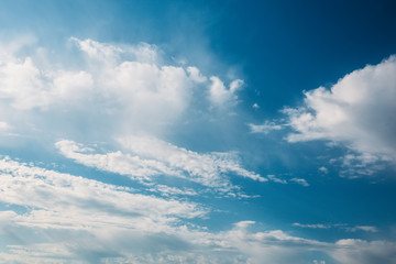 Fototapeta na wymiar White fluffy clouds in blue sky beautiful air nature background