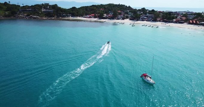 Thai taxi boat arrived at Haad Rin beach line, koh Phangan island,Thailand