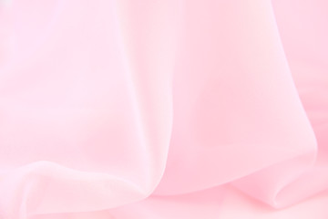 Texture chiffon fabric pink color for backgrounds 