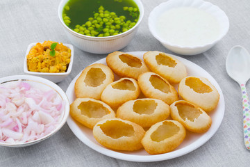 Indian Street Food Pani Puri Also Know as Golgappa or Golgappe is a Common Street Snack From India. It Consists of a Round, Hollow Puri Filled With a Mixture of Flavoured Water And Other Chat Items.