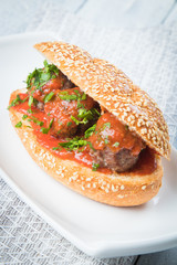 Meatball sandwich with tomato sauce