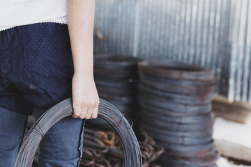 Children working at construction site for world day against children labour concept: