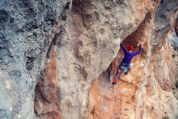 A rock climber on a rock.