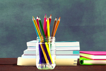 Books ,pen,pencil and office equipment on blue  background, education and back to school concept,Clipping path