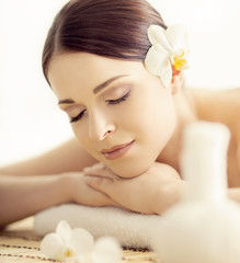 Young and beautiful woman in spa. Massaging and healing concept.