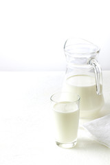 Milk in a jug and a glass