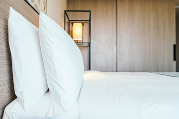 Fototapeta na wymiar White pillow on bed