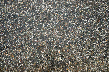 texture of the stones in the asphalt surface background