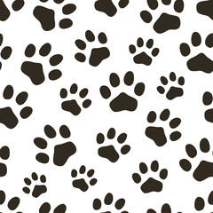 Fototapeta na wymiar Seamless pattern of dog tracks. Vector illustration.