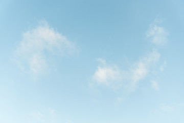 Cloudy blue sky background.
