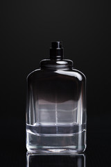 perfume bottle on a dark background