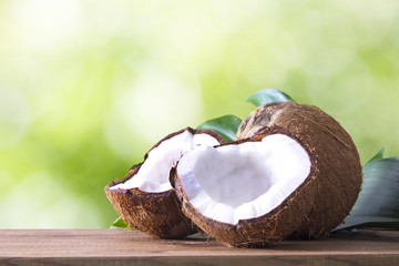 coconut open to natural on wooden bottom - obrazy, fototapety, plakaty