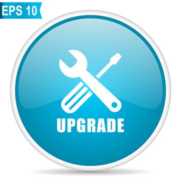 Upgrade blue glossy round vector icon in eps 10. Editable modern design internet button on white background.
