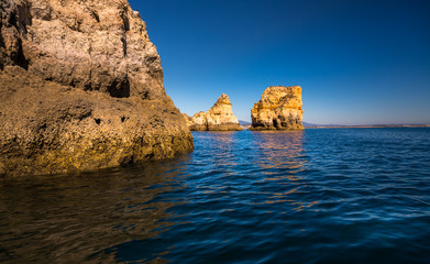 Lagos Caves and Seashore with its Esmerald Water. Exposure done in a boat tour in the Lagos seashore, Algarve, Portugal