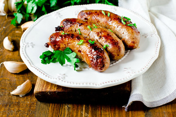 Homemade sausages from turkey (chicken) fried in a frying pan
