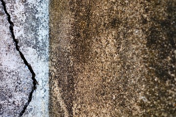 Closed-up Broken Concrete Wall Texture Background. (Selective Focus)