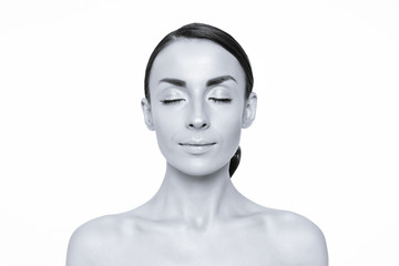 Women's beauty and health. Portrait of a beautiful smiling young woman with clean skin and confident look. Cosmetology. Makeup. Skin care. Fashion style. Black and white