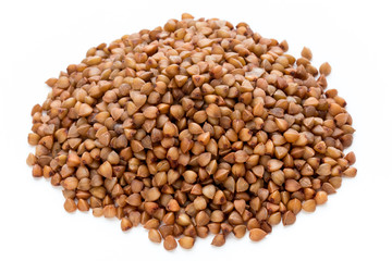 Buckwheat grains isolated on the white background.