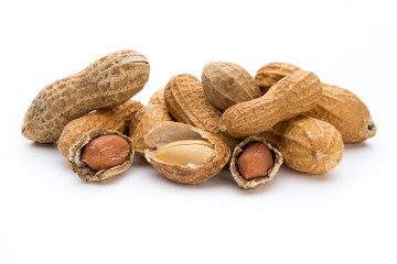 Dried peanuts on the white background.