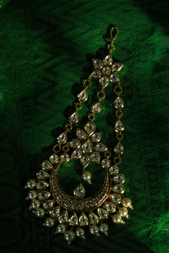 beautiful Indian wedding jewellery in low light 