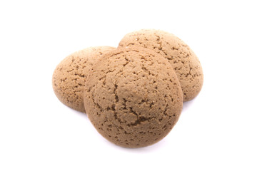 Three round oatmeal cookies on white background
