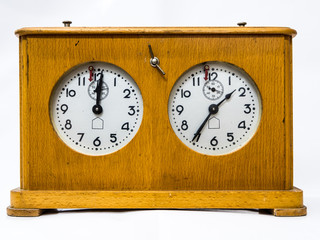Wooden chess clock on a white background