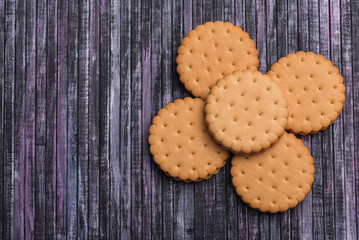 Cookies on wooden background. A place for a label. Place of text. Tea biscuits. Coffee biscuits.
