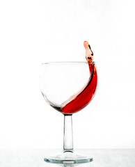 A beautiful splash of wine in a glass