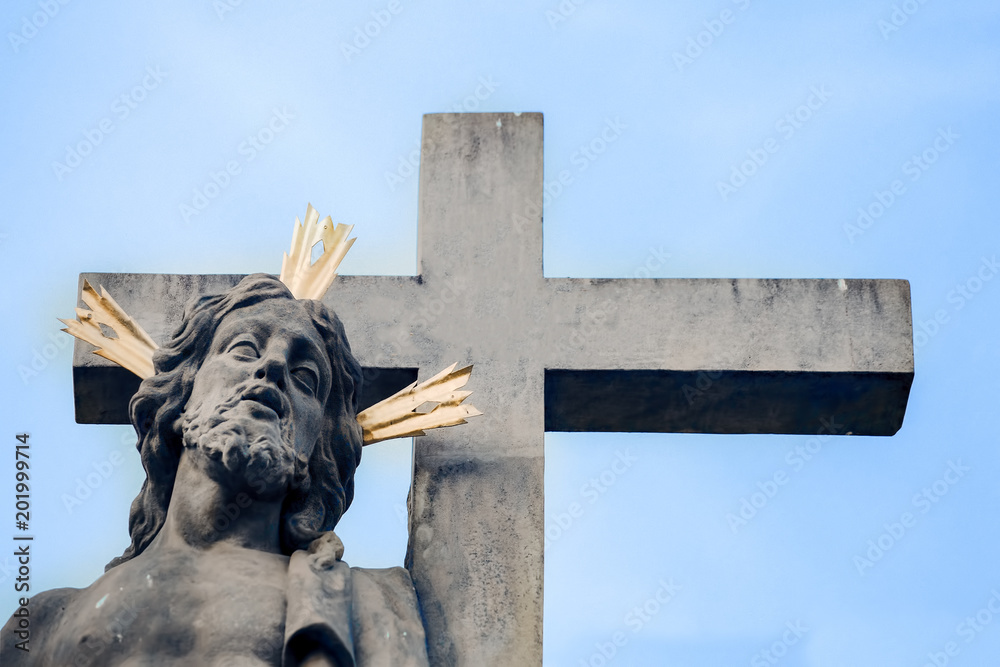 Wall mural jesus christ holds the cross. the concept of christianity, catholicism. the background of the sky.