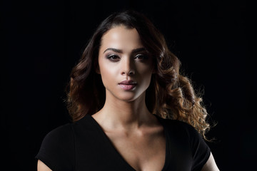 Fototapeta premium Beautiful and attractive model in black dress.