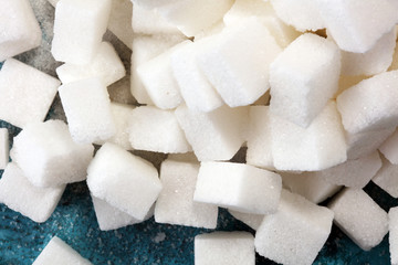 sugar cubes. unhealthy living with white sugar cube