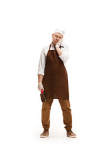 Bored butcher posing with a cleaver isolated on white background