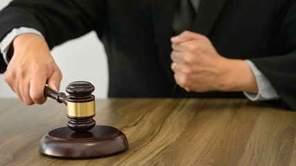 justice lawyer / judge gavel in a court room