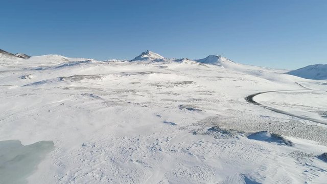 Flying above winter landscape in east Iceland.