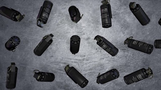 Grenades on a gray background levitation of standard timed fuze hand grenades. Tear-gas hand grenades rotation on grey background