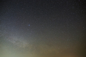 Night sky with a bright star of the Milky Way. View of the starry space
