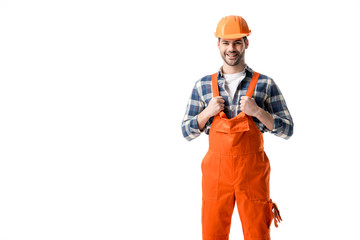 Smiling repairman in orange overall and hard hat isolated on white