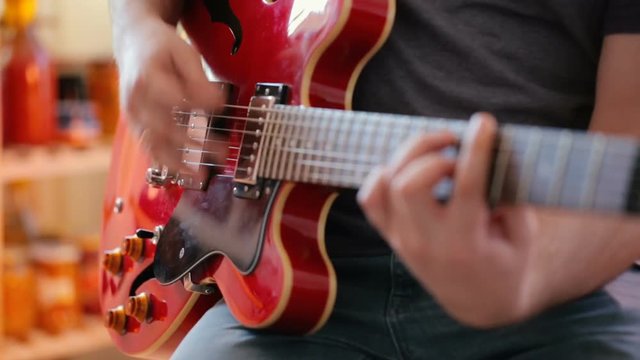 Musician playing electric guitar