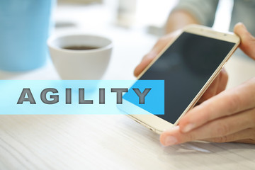Agility text on virtual screen. Business technology and internet concept.