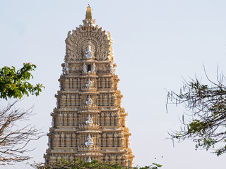 Fototapeta na wymiar The intricately carved Gopuram, or gateway, to the Shri Chanundeshwari temple on the outskirts of Mysore