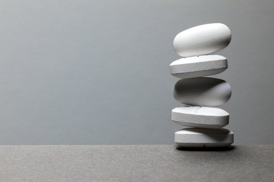 Studio shot of stacked white pills