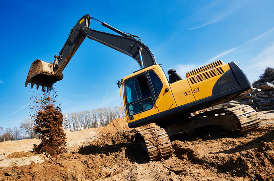 excavator loader machine at construction site